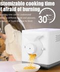 Badass 1600W Electric Coffee Bean Roaster With Slick Digital Display Rock Solid 1500G Capacity on a kitchen counter.