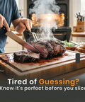 Person slicing roasted meat in a kitchen with V Prime Wireless Meat Thermometer With 1200F Heat Resistance Unlimited WiFi.