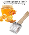 Honey Uncapping Roller Manual Honey Extractor With Plastic Needle Roller and Wooden Handle next to honey jar