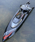 Eighteen Inch Brushless RC Speed Boat With Two Four GHz Remote Control Four Wheel Drive Watercraft on water surface