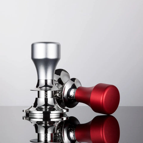 Top Shelf Adjustable Coffee Tamper With Smooth Flat Base Stainless Steel Barista Tool For Your Daily Grind with silver and red handles.