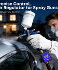 Person using digital air pressure regulator quarter-inch NPT, adjustable 0-200 PSI with gauge on spray gun at night