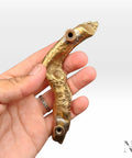 Branch Shaped Cabinet Handle Dope Farmhouse Vibe Solid Brass Drawer Pull With Antique Gold Finish held in hand for size reference.