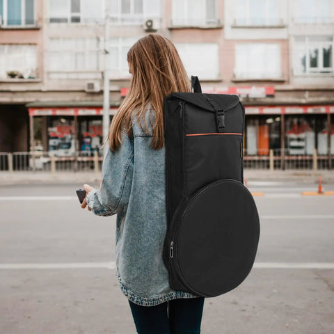 Yo Drummer Grab This Flat Out Tough Oxford Carrier Bag For Snare And Practice Pads on a person walking, showcasing padded and waterproof features.