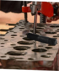 Hydraulic Heavy Duty Workhorse Knockout Punch Driver Kit For Metal Sheets in use on metal piece with multiple hole punches