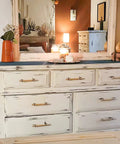 White dresser with 10 Pack Wooden Drawer Pulls And Knobs Natural Wood And Metal T Bar Cabinet Handles, modern Scandi style in bedroom.