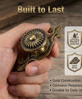 Hand holding 12 Pack Brass Cabinet Knobs With Backplates Antique Vintage Retro Style, highlighting rust-resistant and solid metal features.