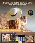 Person using 8K Ultra HD Digital Camera for Vlogging and YouTube Photography with Dual Front and Rear Lenses in a scenic location.