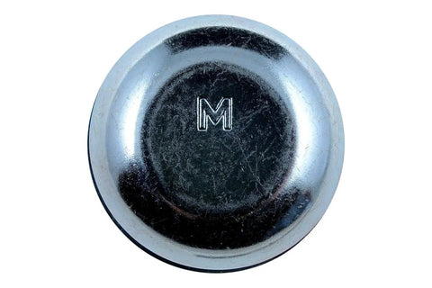 Silver Wheel Dust Cap For Daily Drivers, two inch outside diameter hub cover showing shiny surface and M logo.