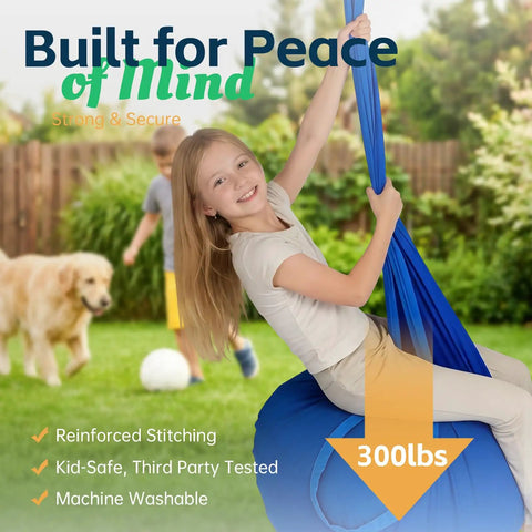 Girl smiling in blue Indoor Outdoor Sensory Pod Swing Chair in garden, supports up to 300 lbs, for Aspergers Autism ADHD SPD therapy.