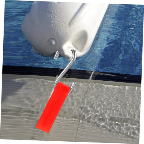 Pool float hanger hook with orange grip attached to a white pool float, angled view.