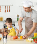 Father and son cooking with Must Have Go To Kitchen Utensil Set With Holder Natural Teak Wood Tools For Cooking on counter.