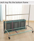 26 Inch Stainless Steel Broom And Mop Holder Rack With Built In Water Basin, showing frame with wheels