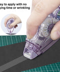 Hand using Double Sided Scrapbooking Tape Runner 4 Pack, 26 Feet By 0.31 Inch, Great For Crafts And Junk Journals, on paper