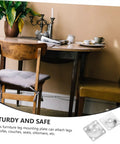 Heavy Duty Table Leg Mounting Plates For Furniture And Sofa Feet Connectors With Pre Drilled Holes displayed with a wooden table and chairs.