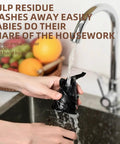 Cleaning the Aynefy 200W Cold Press Juicer with water, showcasing easy cleanup after juicing for fresh nutrient extraction.