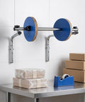 Kickass Wall Mount Bubble Wrap Dispenser With Hella Durable Foldable Steel Frame Adjusts 30 To 150Cm Rolls for warehouse packing setup.