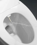 Non Electric Bidet Toilet Seat With Self Cleaning Retractable Nozzle For Elongated White Toilet Seats No Fuss Easy Installation And Adjustable Water Pressure CUPC Certified showing water spray action