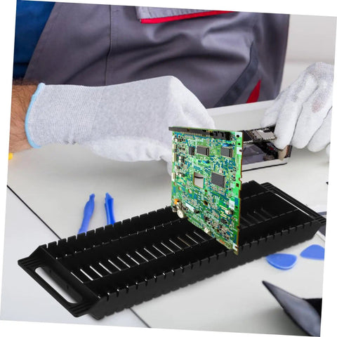 Person placing a PCB into a Six Pack Circuit Board Rack Antistatic Holder Stand for PCB Storage and Display Durable Groove Design.