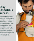 Man accessing pocket in Duro 6L Running Hydration Vest With Hydraulics Soft Flasks Included, Men’s Sandy Grey Medium