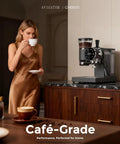 Woman enjoying coffee from Badass 20 Bar Espresso Machine With Led Touch Control And Adjustable Burr Grinder for home use.