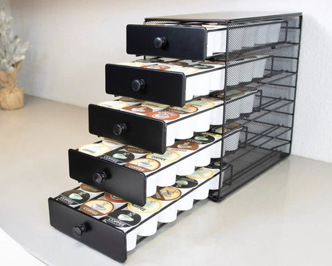 Boss Level Coffee Pod Drawer in Black Satin finish with 5 open tiers holding up to 90 K-Cup pods on a countertop.
