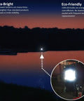Taclight LED Lantern 8-Inch With Magnetic Base Portable Super Bright Collapsible Camping Light shining at night by a lake