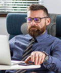 Man using Cozy Recliner Pillow Neck Support Headrest Cushion for Travel and Home Office Relaxation Pain Relief on chair