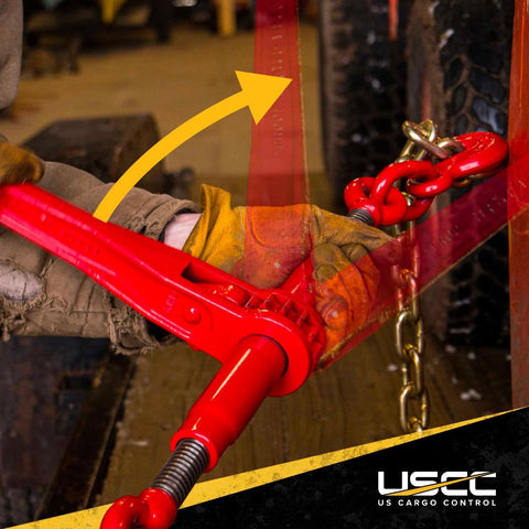 Worker adjusting Five Pack Heavy Duty Ratchet Chain Binders For Three Eighth And One Half Inch Chains With 9200 Lbs Working Load Limit