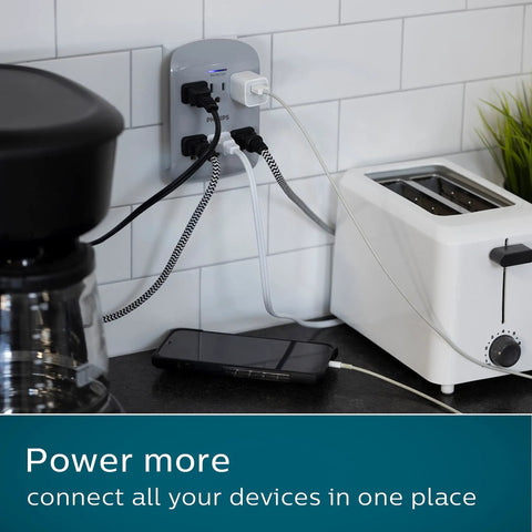 Six Outlet Surge Protector Extender, 900 Joules, 3-Prong Wall Tap in use with multiple devices in kitchen setting