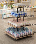 Heavy Duty 4 Tier Square Steel Storage Rack Multipurpose Industrial Display Shelf For Kitchen Warehouse Garage Pantry Organization Versatile Space Saving Unit Built Tough For Daily Heavy Lifting with products organized on shelves.