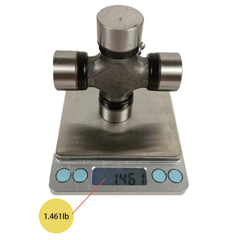 5-178X U Joint Kit 1350 Series OSR Replacement on scale weighing 1.461 lb, showcasing bearing cap design and measurement.