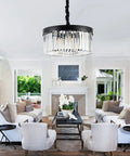Black Crystal Chandelier Pendant Lighting, 2 Tier Modern Round Ceiling Fixture With Adjustable Height Chain in a living room.