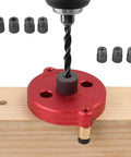 Self Centering Dowel Jig With Swap In Bushings For Knockout Precision Portable Guide Tool drilling into wood with metal bushings.