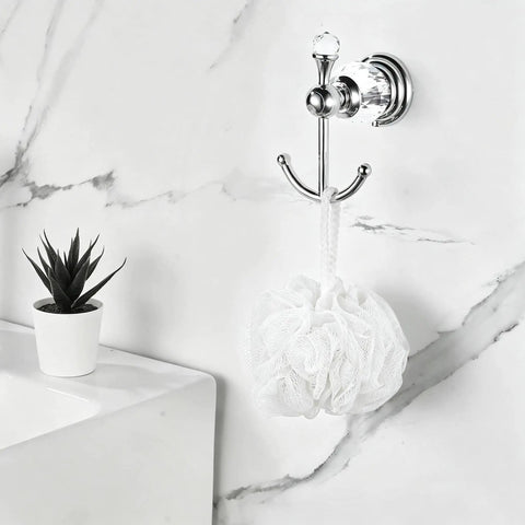 Heavy Duty Polished Chrome Crystal Wall Hook Top Shelf Bathroom Robe Hanger for hanging a white mesh loofah.