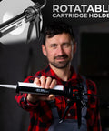 Man holding heavy duty caulking gun with twenty five to one thrust ratio for standard ten ounce 300ml cartridges