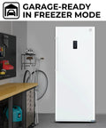 Built Tough 17 Cubic Foot Upright Convertible Fridge And Freezer With Auto Defrost garage-ready in freezer mode in a workshop.