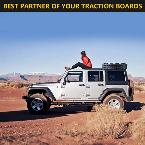 SUV with Lockable Mounting Pins For MKII Recovery Traction Boards 4 Pack secured on roof in desert terrain.