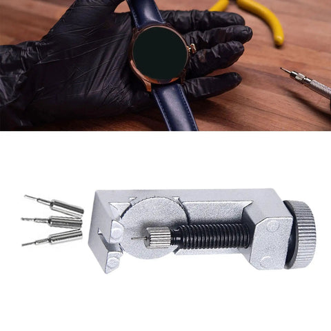 Watch Chain Link Remover Kit With Spring Bar Tool And Pin Replacements for band adjustment next to a blue watch strap