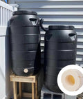 ABS Bulkhead Fitting 3 Inch Double Thread Connector Adapter With Plugs installed on black rain barrels under sunlight