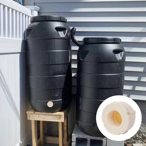 ABS Bulkhead Fitting 3 Inch Double Thread Connector Adapter With Plugs installed on black rain barrels under sunlight