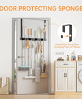 Over The Door Broom And Mop Holder In 304 Stainless Steel Wall Mount Or Door Hanging With Hooks installed on door with cleaning tools.