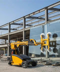Badass Heavy Duty Glass Vacuum Lifter With Adjustable Electric Suction Cups lifting large glass panel at construction site.