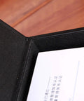 Corner view of Premium PU Leather Tissue Box Holder With Lid Black Dope Napkin Dispenser showing interior lining and tissue fit
