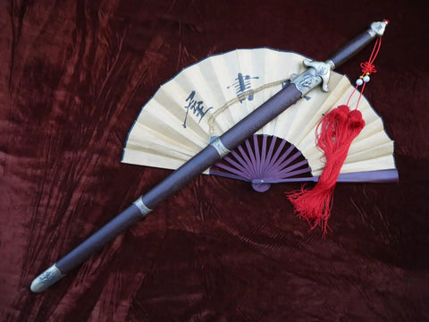 Tai Chi Training Sword With Dope Stainless Steel Flexible Blade 28 Inch Blade 39 Inch Overall Hand Made Heat Tempered Longquan Style Rosewood Scabbard And Handle Ideal For Martial Arts Practice next to closed fan