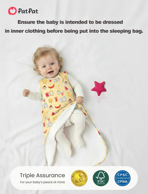 Baby wearing Soft Bamboo Viscose Baby Sleep Sack 1.0 TOG For 0-6 Months, Breakfast Friends, lying on a bed with a pink star toy.