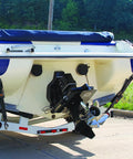 Boat with Beefed Up Heavy Duty Boat Trailer Transom Straps 2 Pack, 2In X 24In Adjustable Tie Downs visible on a trailer
