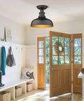 Semi Flush Mount Ceiling Light in Black with Copper Accents above an entryway, industrial farmhouse style, 11.5 inch diameter.
