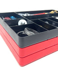 Stacked red and black 10 Compartment Drawer Organizer Tray For Tools Small Parts Batteries And Supplies, Stackable Workbench And Toolbox Organizer, 16 By 11 By 1.5 Inches, Red OT10R Made In The USA with items in compartments