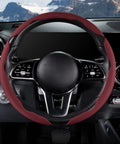 Slick And Hella Comfortable Premium Perforated Leather Steering Wheel Cover on black steering wheel with wine red grip.